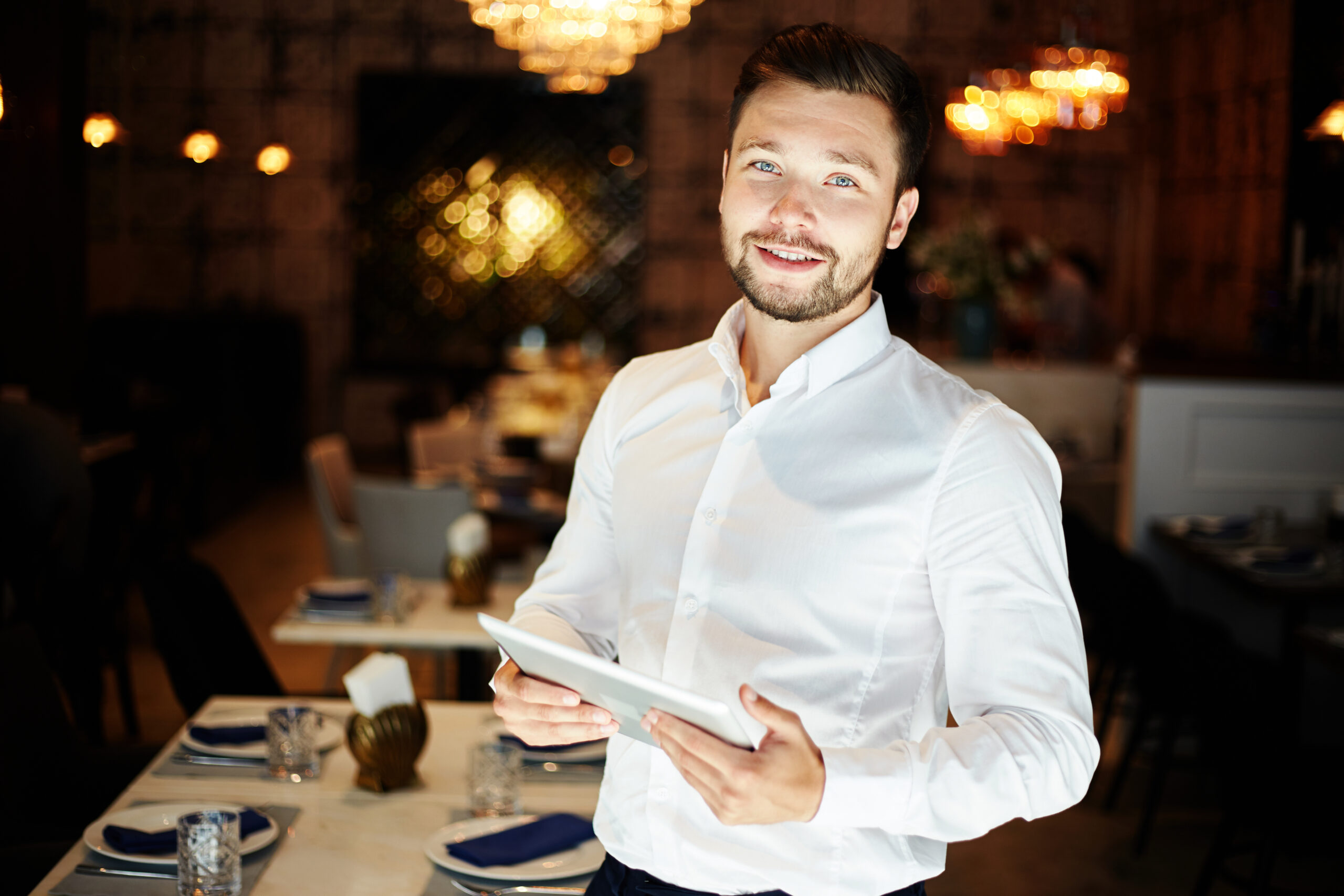 Happy Restaurant Staff using Dojo Bookings Restaurant Management Software.